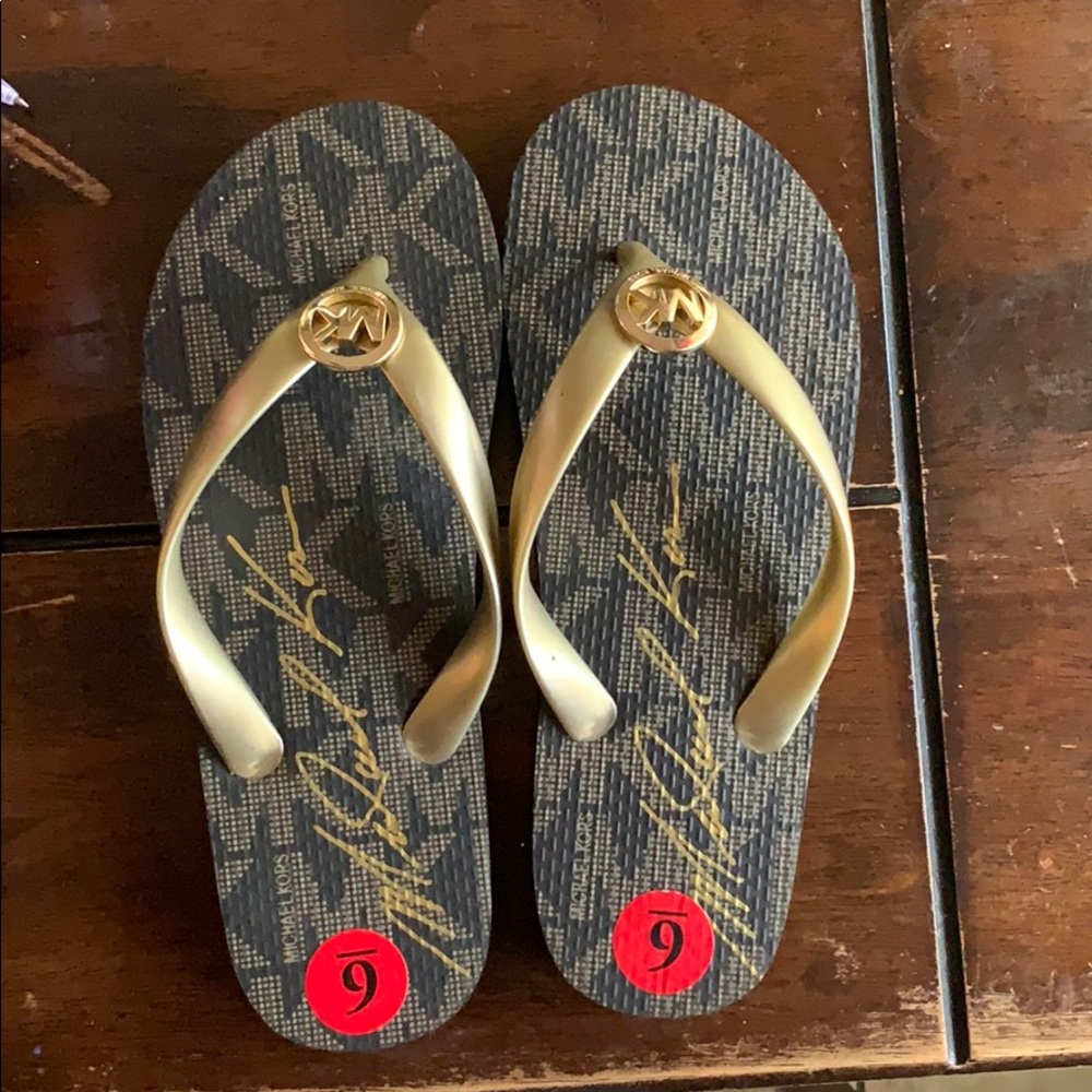 MICHEAL KORS FLIP FLOPS